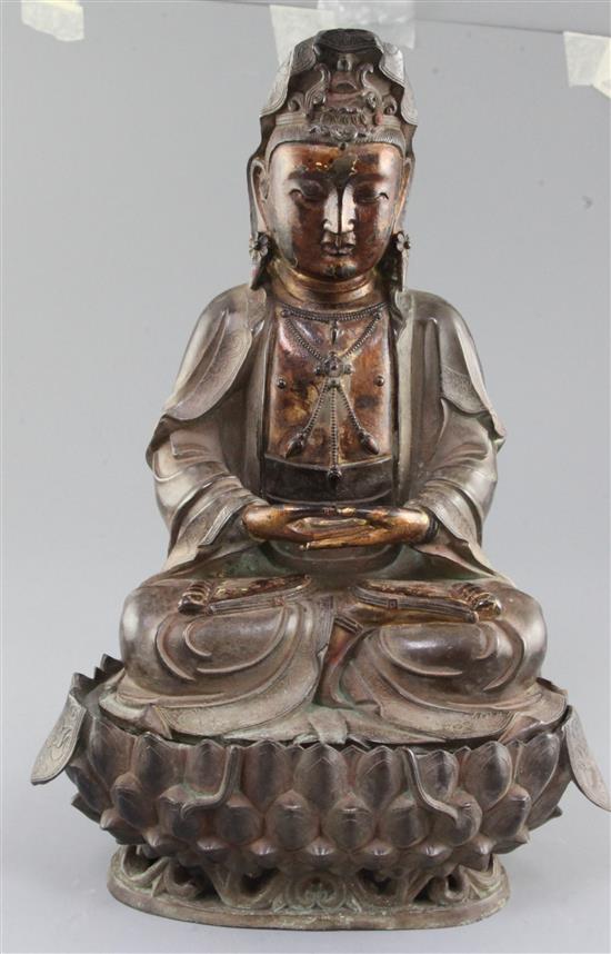 A large Chinese lacquered bronze seated figure of Guanyin, height 35cm